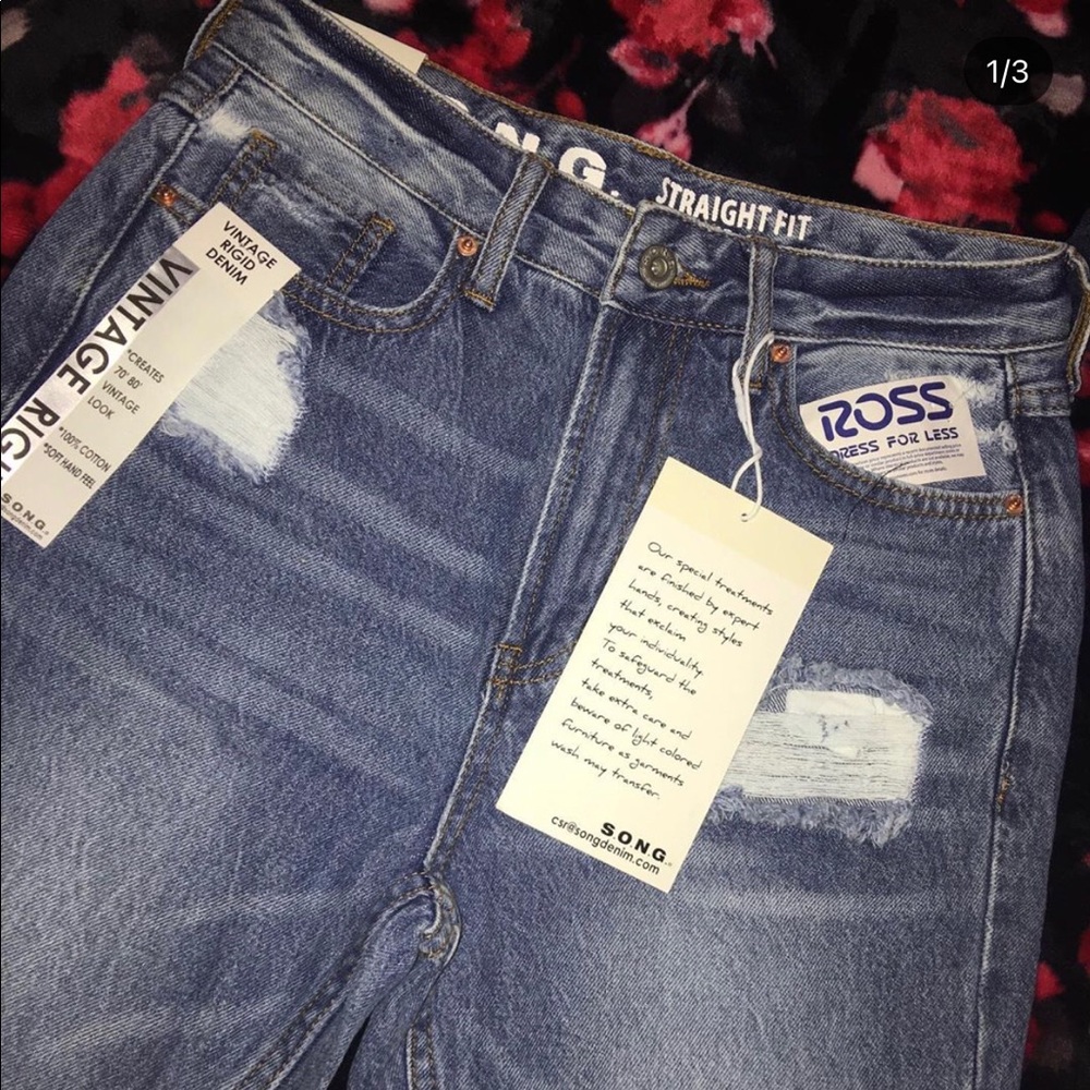 Distressed straight jeans